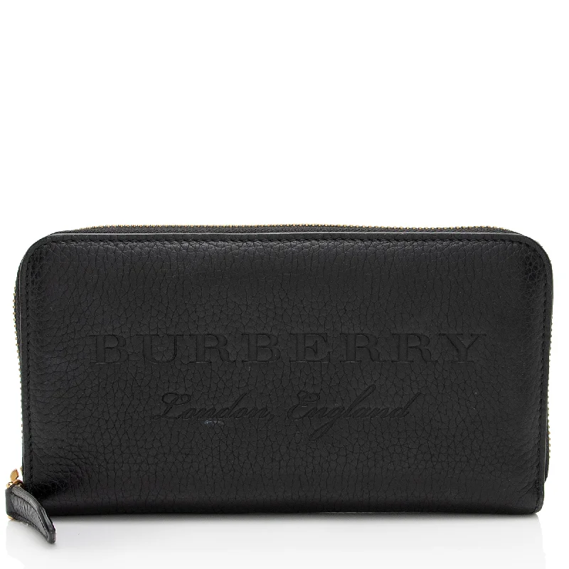 Keychains with tassel accents-Burberry Embossed Grainy Calfskin Zip Around Wallet