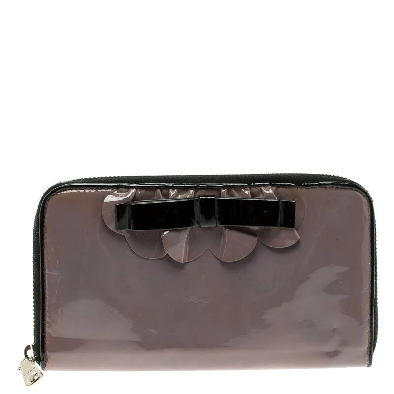 Wallets with snap slots-Miu Miu Lilac Patent Leather Zip Around Wallet..