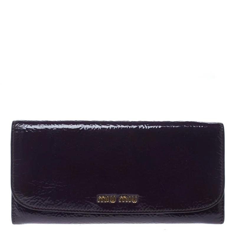 Wallets with small flaps-Miu Miu Purple Patent Leather Continental Wallet..