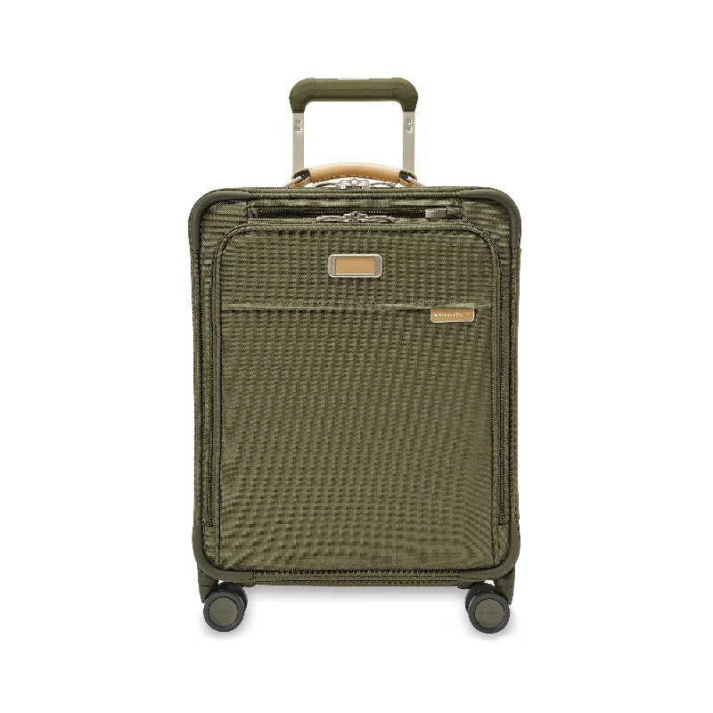 Suitcase with side pockets-Baseline GLOBAL CARRY-ON SPINNER