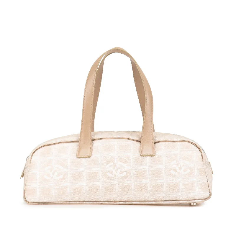 Handbag boutique finds-Beige Chanel New Travel Line Handbag